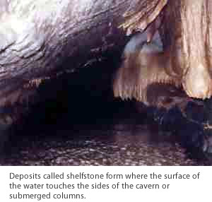 Rimstone is left after the water has seeped to a lower level in the cave.